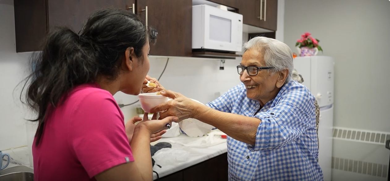 Resident feeding team member